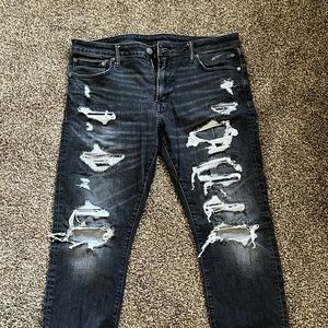 Distressed American Eagle slim men’s jeans in black wash